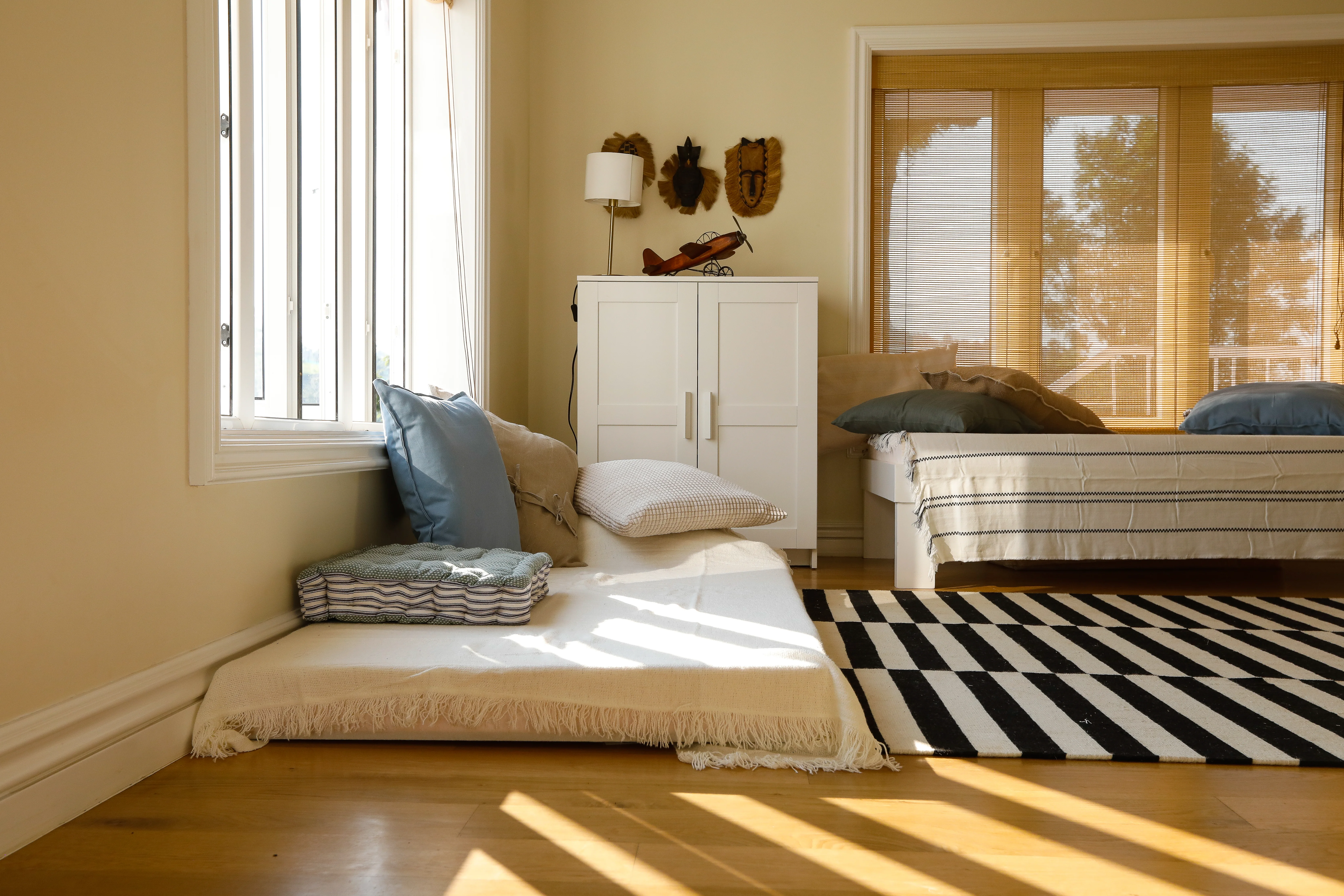 A window seat with cushions at the Coonoor bungalow