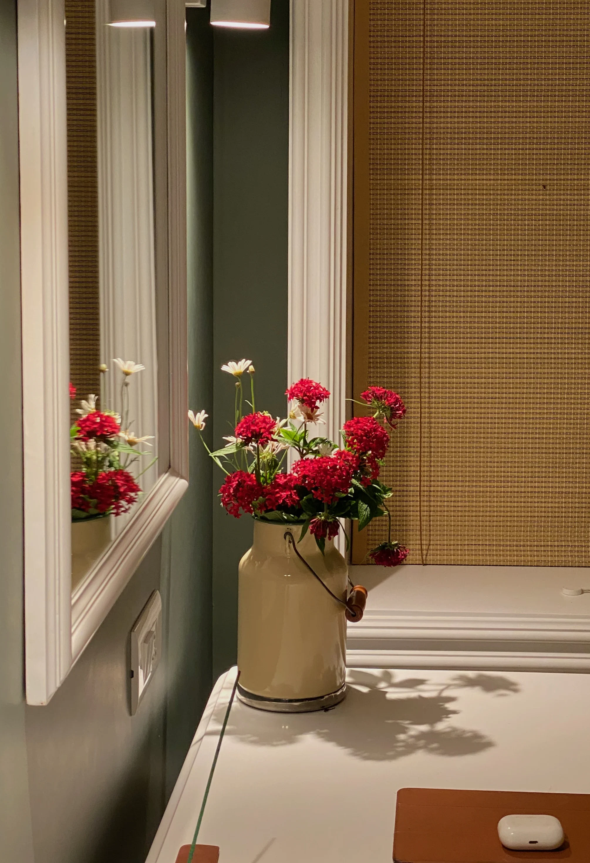 A white washbasin with brass fittings at the Coonoor bungalow