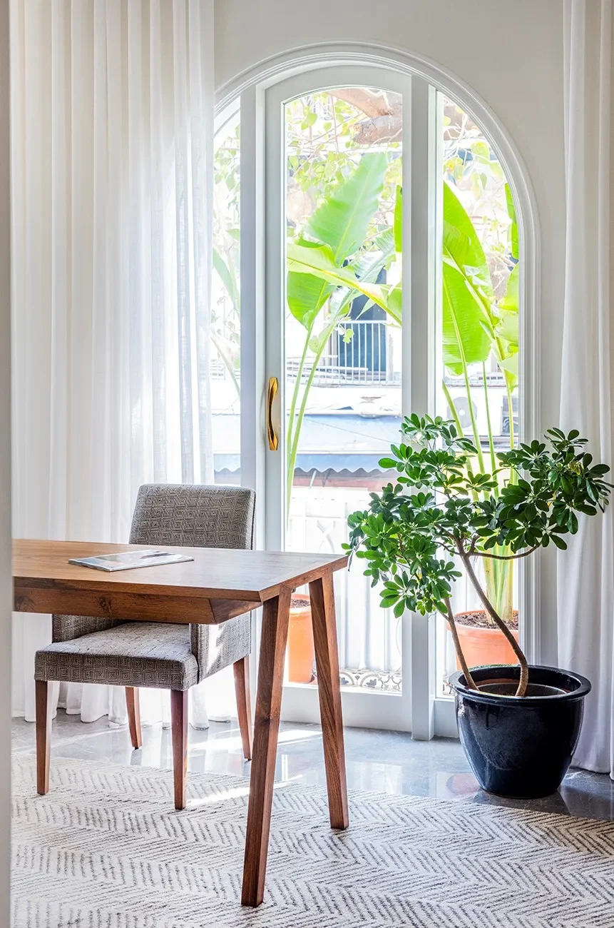 A desk at the arched window at The Healing Centre
