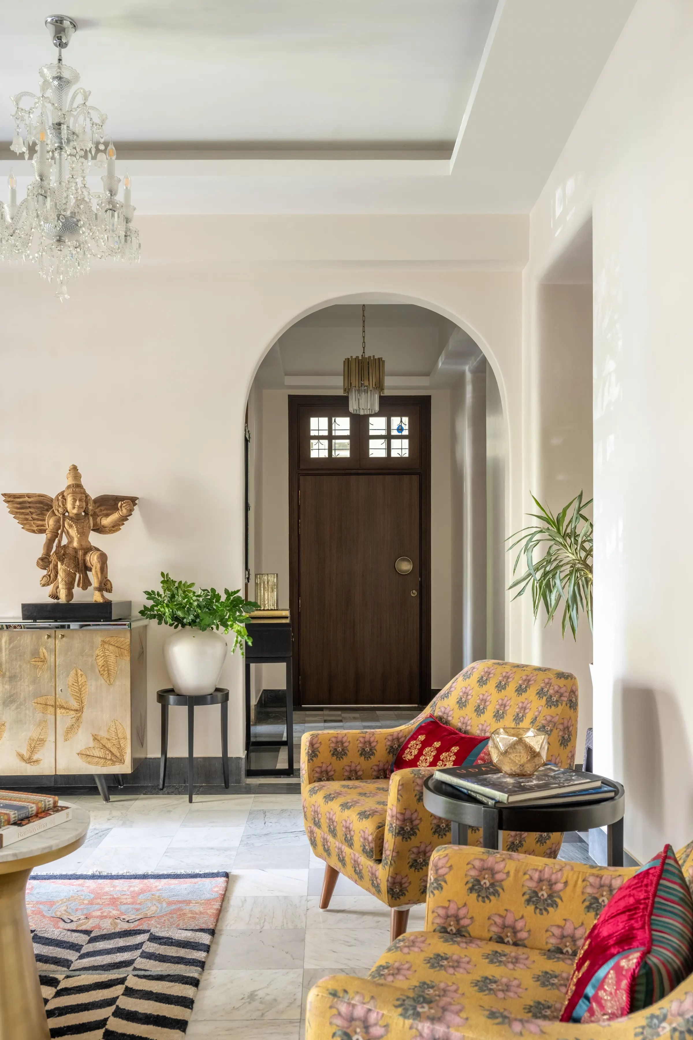 The entrance hall at Nook Home, a Garuda on the console