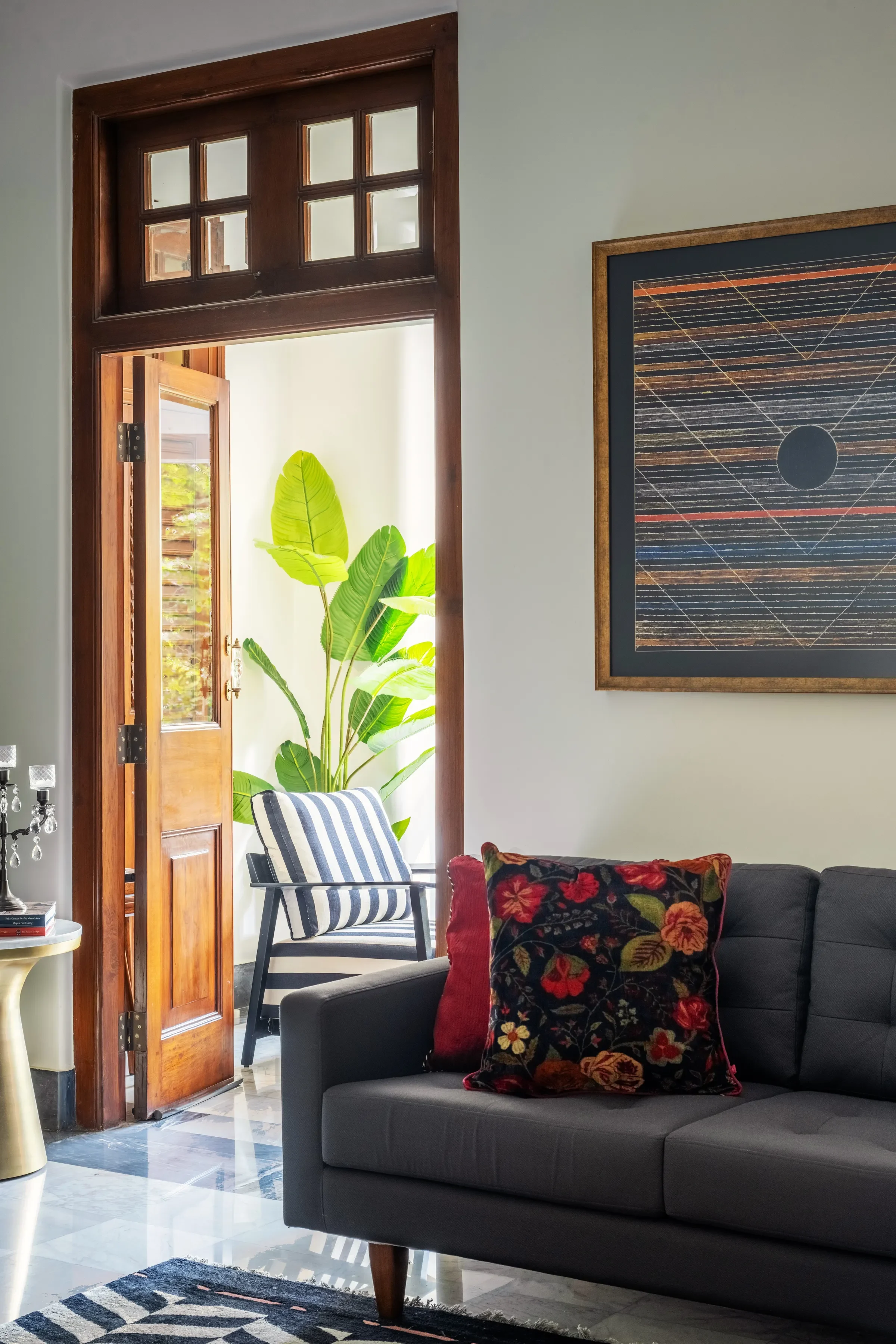 A doorway open to the balcony at Nook Home