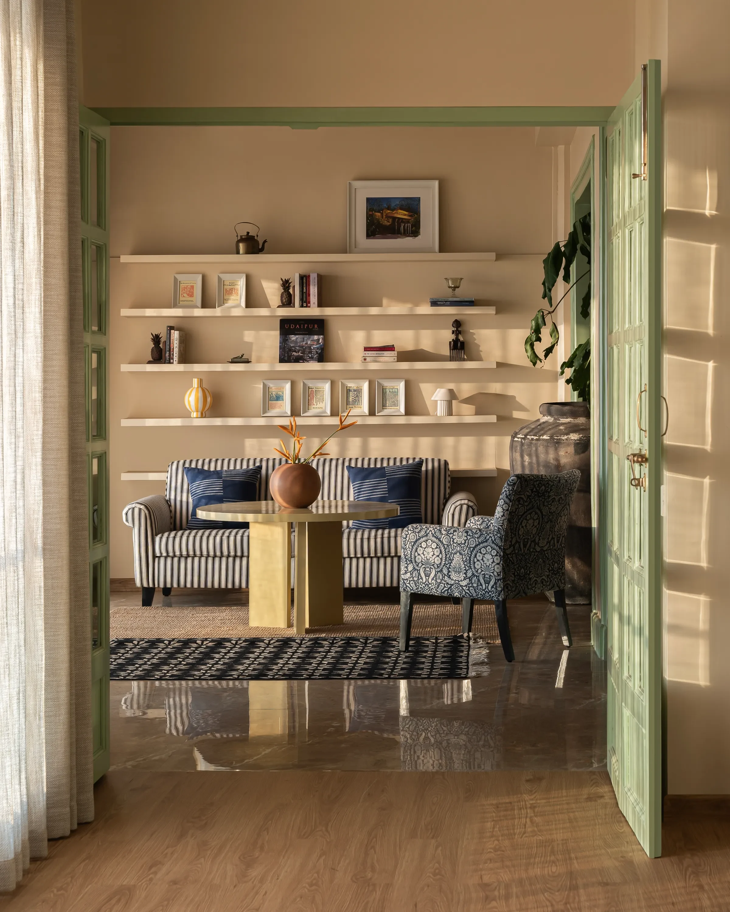 The green doors to the living room at Tranquila