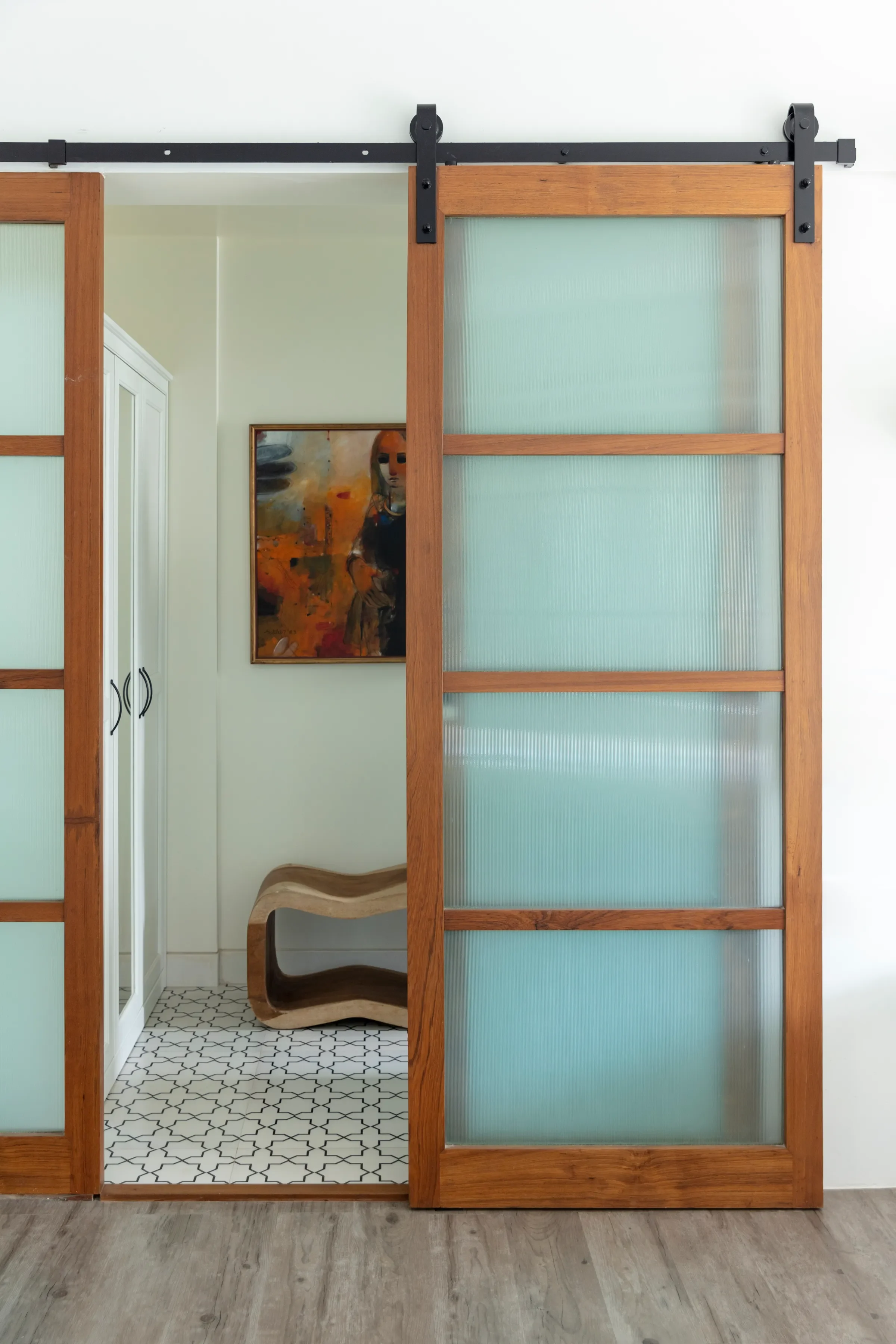 The frosted glass barn door at The Deep Dive