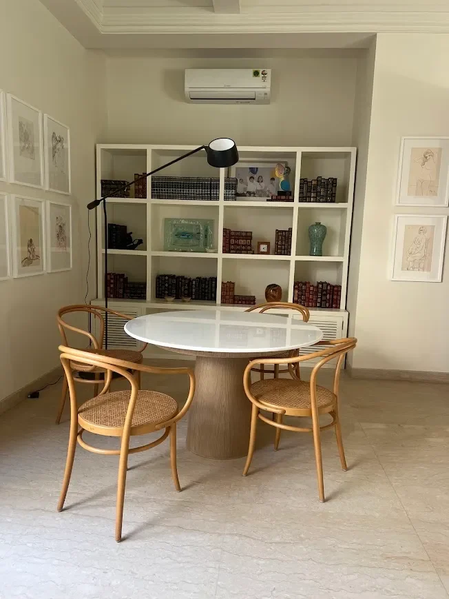The breakfast table and bentwood chairs at the Delhi farmhouse