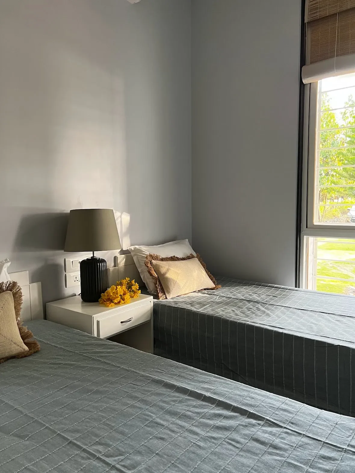 A bed at the window at the Malkhed house