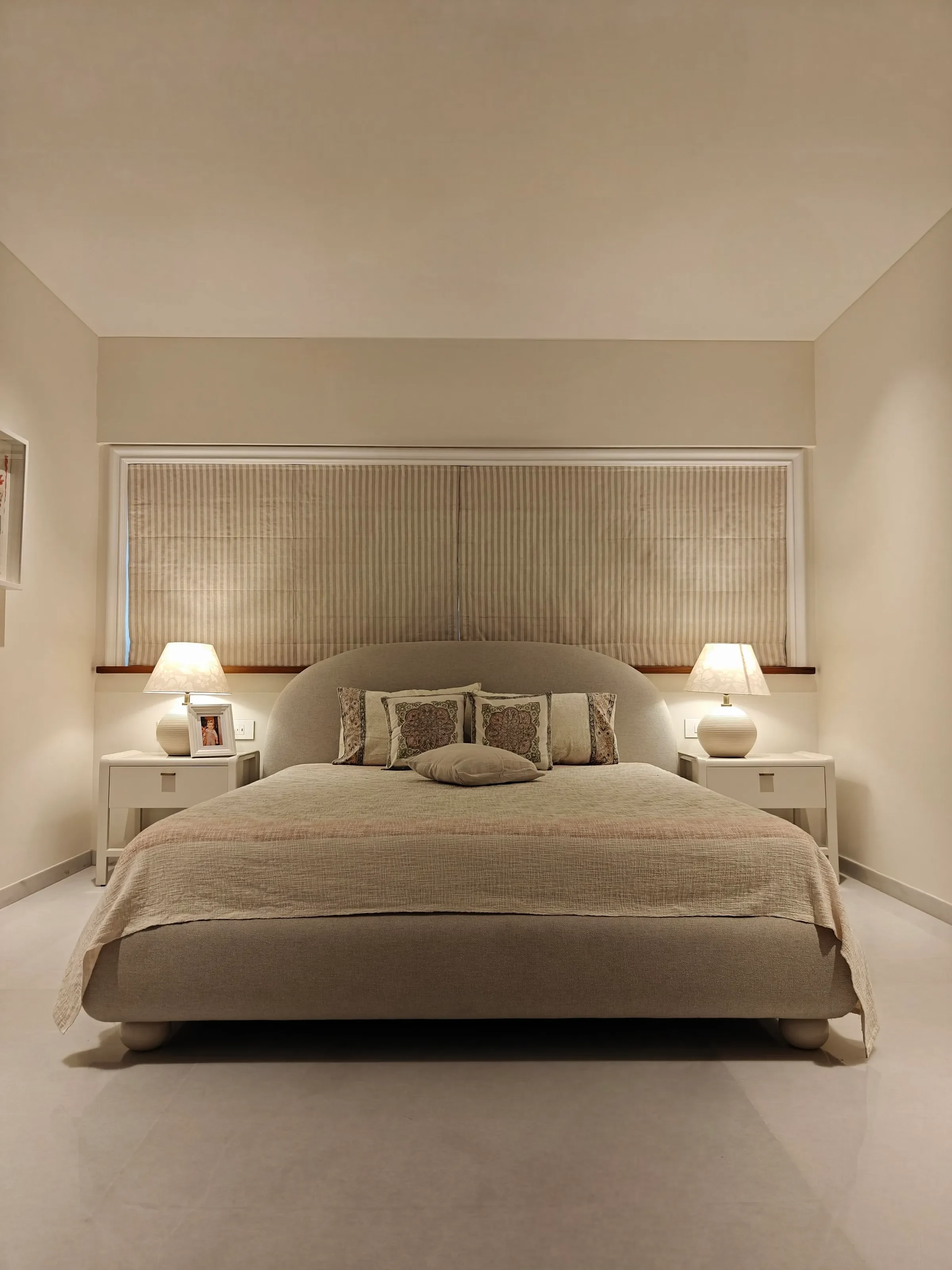 The main bedroom in beige at the Sterling apartment