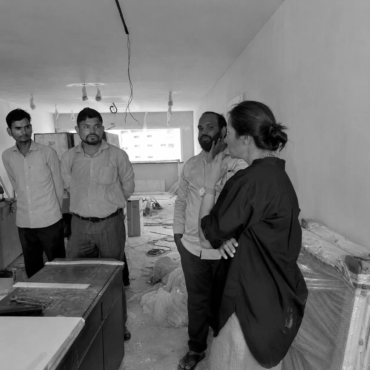 A site walkthrough with the contractors, walls still bare